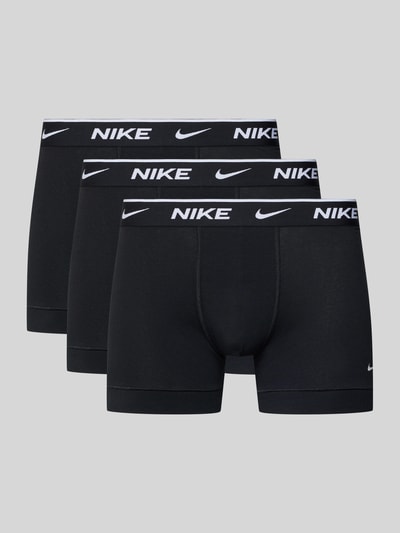 Produktfoto, schwarze Trunks aus Baumwoll-Mix Modell 'ESSENTIAL' von Nike mit elastischem Logo-Bund und eng anliegender Passform