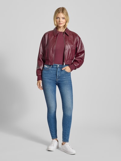 Calvin Klein Jeans Jeansy o kroju skinny fit z wysokim stanem i detalem z logo Ciemnoniebieski 1