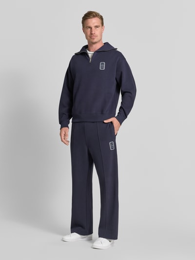 Lacoste Loose fit sweaterbroek van katoenmix model 'Tenn' Marineblauw - 1
