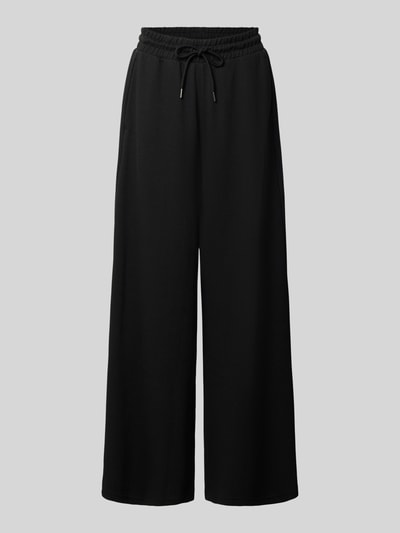 Produktfoto, Relaxed Fit Sweathose aus reiner Baumwolle von PUMA, schwarze Damen Sweathose mit weitem Bein und Struktur, auf grauem Hintergrund