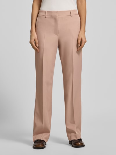 Vrouwenmodel draagt Stoffhose mit Gesäßtasche van Jake*s Collection in lichtroze, materiaal-mix met stretch, losse fit, detailopname voorkant.