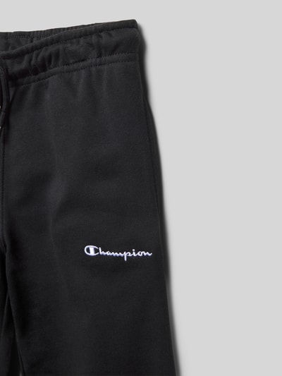 Productfoto, 'Sweatpants mit Label-Stitching' van CHAMPION, zwart, katoenmix, regular fit, elastische tailleband, tunnelkoord, labelstiksel