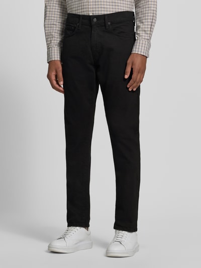 Mannmodel draagt Slim Fit Jeans aus Baumwoll-Mix Modell 'SULLIVAN' van Polo Ralph Lauren in zwart, heren slim jeans, ganzkörperansicht van voren.