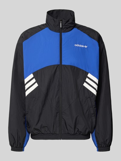 Produktfoto, Regular Fit Trainingsjacke im Two-Tone-Design Modell 'MUC TT' von adidas Originals in Schwarz und Blau mit weißen Streifen, Herren Trainingsjacke