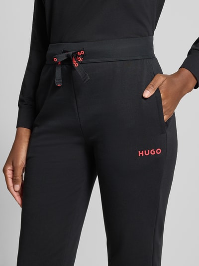 HUGO Spodnie sportowe o kroju regular fit z mieszanki bawełny Czarny 3