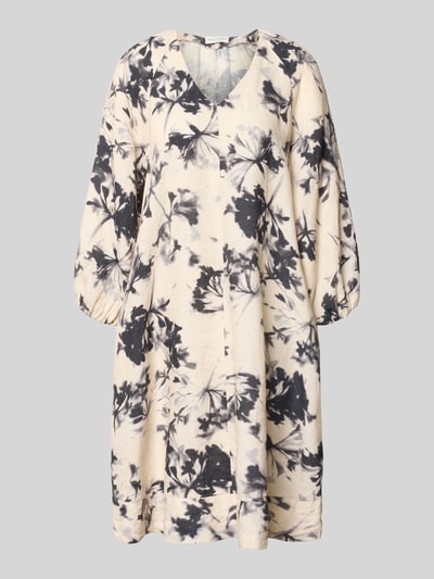 Produktfoto, Fließendes Tunikakleid aus reinem Leinen von Marc O'Polo in Optik:Allover-Muster mit floralen Details, Passform fließend, Midi-Länge, V-Ausschnitt, Kurzarm mit elastischem Ärmelabschluss, Materialverarbeitung Flammgarn, reines Leinen, natürliche Textur in Beige und Schwarz.