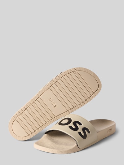 Productfoto, Badeschuhe mit Label-Prägung Modell 'ARYEH' van BOSS, look: effen kleuren, punt van de schoen: rond, hakvorm: plat, applicatie: label in reliëf, zool: gestructureerd