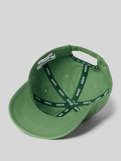 Produktfoto, Basecap aus reiner Baumwolle von Lacoste in Grün, feine Webstruktur, Schnallenverschluss, Label Patch innen, unifarben
