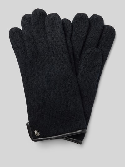 Produktfoto, Handschuhe aus reiner Schurwolle von Roeckl, Fingerhandschuhe in Schwarz mit Strick-Optik und metallic Label-Detail.