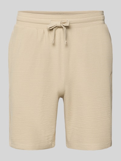 Produktfoto, Loose Fit Sweatshorts aus Bio-Baumwoll-Mix Modell 'KIAN' von Only & Sons, Optik: Unifarben, Struktur-Piqué, elastischer Bund mit Tunnelzug, seitliche Eingrifftaschen, angedeutete Paspeltaschen, Label-Patch, Materialverarbeitung: Piqué, beige Farbe.