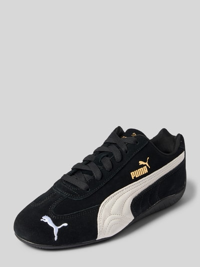 Produktfoto, Sneaker aus Leder-Mix Modell 'Speedcat' von PUMA in Schwarz mit beiger Seitenpartie, abgerundeter Spitze, Label-Details und Logo-Stitching, texturierte Oberfläche, Schnürung, geeignet für Damen, flacher 1 cm Absatz, Schafthöhe 7 cm, Schaftweite 8 cm.