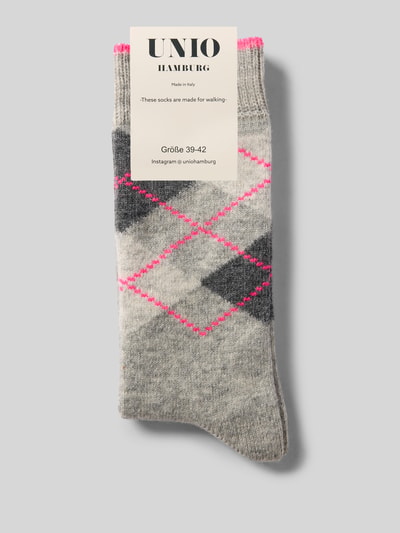 Productfoto, Socken mit Woll-Anteil van UNIO HAMBURG in grijs met felroze en donkere argyle contraststrepen, elastische materiaalmix, ribboordjes