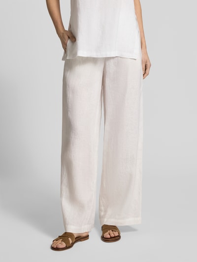 Kobiece modelka nosi Wide Leg Leinenhose mit elastischem Bund Modell 'MOSSI' od ECOALF z lnu, jasny kolor, spodnie z szerokimi nogawkami, szerokość w rozmiarze 36: 36 cm, długość wewnętrzna nogawki: 79 cm, zdjęcie całej sylwetki z przodu.