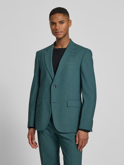 Männermodel trägt Regular Fit Anzugsakko aus Woll-Mix Modell 'AIDAN3' von Strellson in Optik: Unifarben, feine Webstruktur, Ganzkörperansicht von vorne.