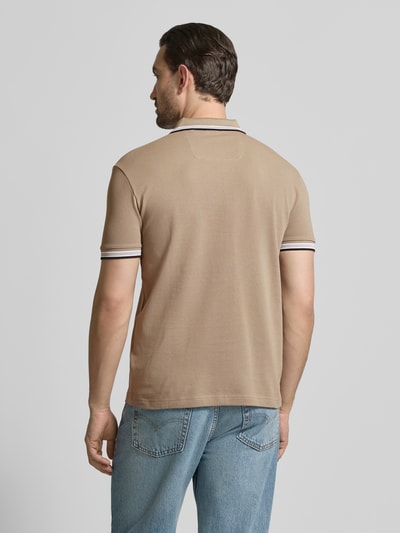 Męski model nosi Regular Fit Poloshirt aus reiner Baumwolle Modell 'PADDY' od BOSS Green, jednolity, piqué, z krótkim rękawem; całkowity widok z tyłu.