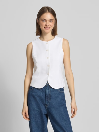 Frauenmodel trägt Regular Fit Weste aus Viskose-Leinen-Mix Modell 'GOA' von Only, Optik: Unifarben, Mao-Kragen, Knopfleiste, Flammgarn, Ganzkörperansicht von vorne.