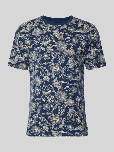 Produktfoto, T-Shirt im Allover-Look mit Rundhalsausschnitt von Scotch & Soda, Herren T-Shirt aus reiner Baumwolle, Regular-Fit, dunkelblau mit beigem floralen Muster, Rückenlänge bei Größe M 70 cm, glatte Stofftextur