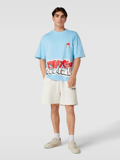 REVIEW Oversized T-Shirt Y2K Logo Hellblau 1