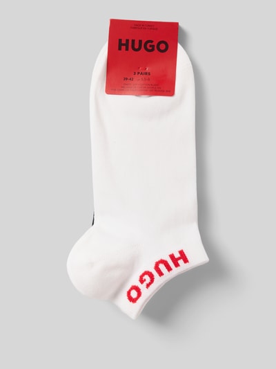 Produktfoto, Socken aus Baumwoll-Mix im 3er-Pack von HUGO, Optik: Unifarben, Bundabschluss: Gerippt, Multipack: 3er-Pack, Material: Baumwoll-Mix, weiß mit rotem Logo, weiche glatte Textur