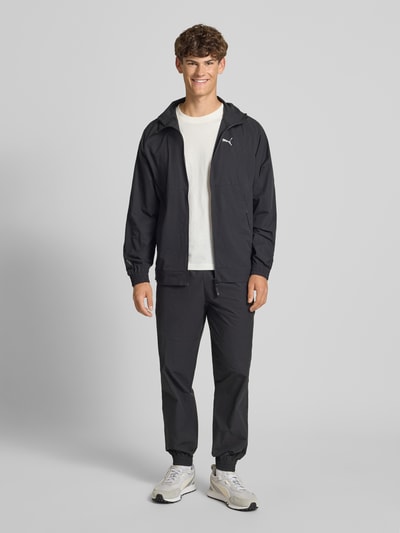 PUMA PERFORMANCE Jogpants mit elastischem Bund Modell 'TECH' Black 1