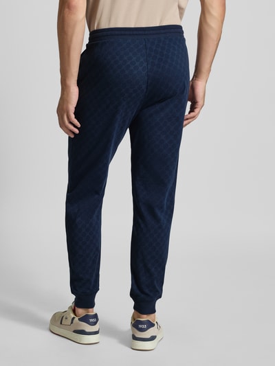 JOOP! Collection Spodnie dresowe męskie JOOP! Collection;Czysta bawełna;Dopasowany krój;Elastyczny pas z trokami;Prążkowane wykończenia;Długość wewnętrzna nogawki w rozmiarze M: 43 cm Granatowy 5