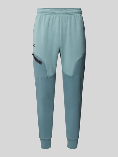 Produktfoto, Sweatpants mit Logo Modell 'Unstoppable' von Under Armour, bawełniany materiał miks, regular fit, elastyczny pas, niebieski odcień, długość nogawki 72 cm, widoczna faktura dzianiny