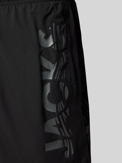 Produktfoto, schwarze Badehose mit Label-Print, Modell 'MAUI WAVE' von Jack & Jones, Regular-Fit, elastischer Bund, glatte Textur