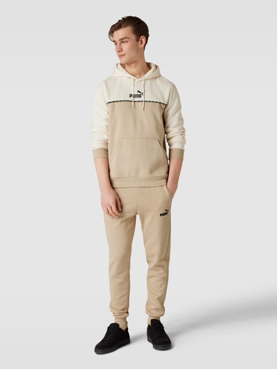 PUMA PERFORMANCE Sweatpants mit Label-Detail Beige 1