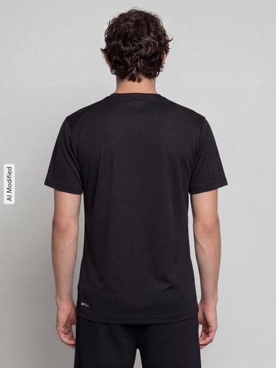 PUMA Performance t-shirt o kroju regular fit z technologią drycell model 'PUMATECH Essentials Tee' Czarny 5
