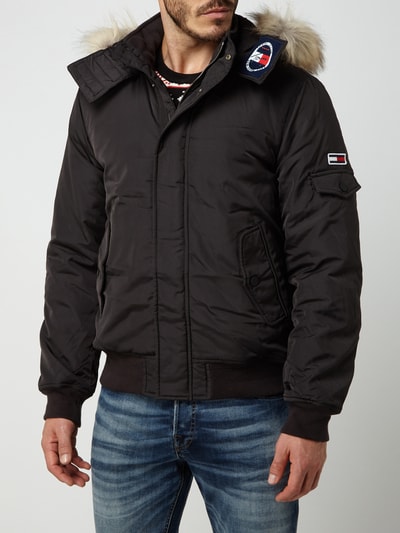 Tommy Jeans Jacke mit abnehmbarer Kapuze - wattiert (black) online 