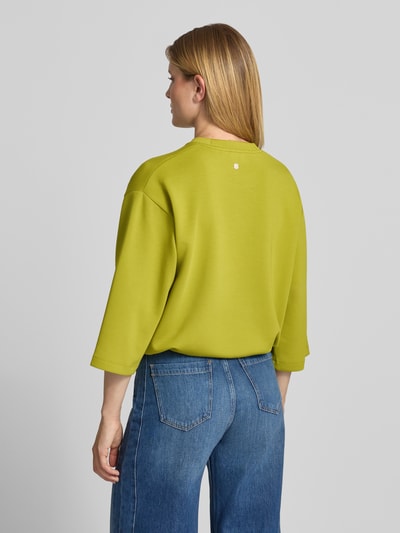 Vrouwenmodel draagt sweatshirt met tunnelkoord Model 'Tahani' van JOOP! in materiaalmix met modal, regular fit, ronde hals, 3/4-mouw, rugaanzicht