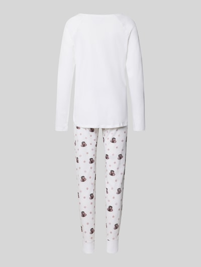 Frauenmodel trägt Regular Fit Pyjama aus reiner Baumwolle Modell 'Meine Auszeit' von LOUIS & LOUISA, Langarm, Allover-Motiv, Ganzkörperansicht Rückansicht.