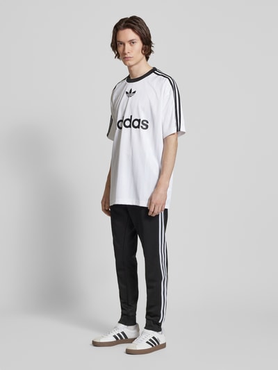 adidas Originals Regular fit trainingsbroek met labelstitching Zwart - 1