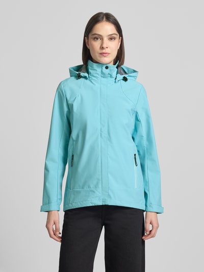 Frauenmodel trägt Parka mit Kapuze und verdecktem Reißverschluss von G.I.G.A. DX in Hellblau, Gerader-Schnitt, wasserabweisend, Label-Patch, seitliche Reißverschlusstaschen, Größenangaben 36: Rückenlänge 70 cm, Schulterbreite 41 cm, Brustweite 51 cm, Ärmellänge 63 cm, Ganzkörperansicht von vorne.