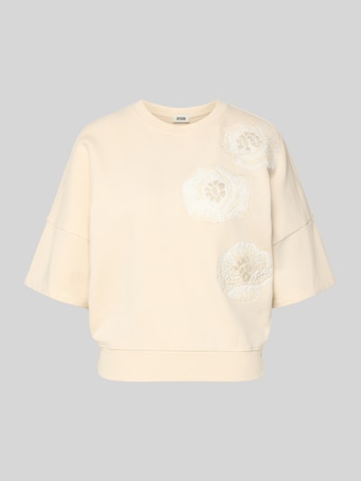 Produktfoto, Sweatshirt mit 1/2-Arm Modell 'MINDULI' von Drykorn in Creme, reine Baumwolle, Loose Fit, florales Motiv-Stitching, gerippter Rundhalsausschnitt
