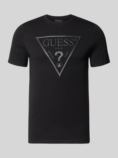 Produktfoto, schwarzes GUESS Herren T-Shirt mit großem Logo, Rundhalsausschnitt, Reine Baumwolle, Slim-Fit, Rückenlänge 70 cm Größe M