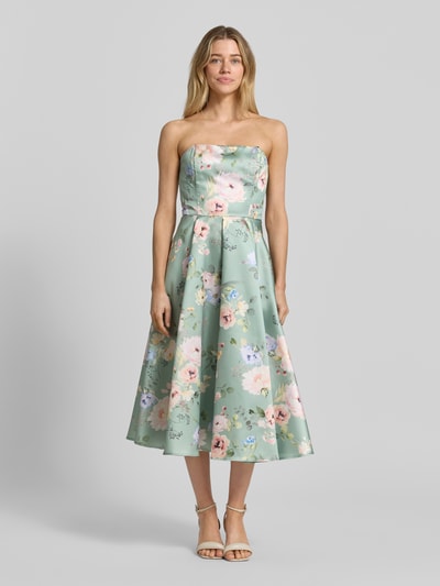 Kobiece modelka nosi sukienkę koktajlową im Off-Shoulder-Look od Swing, taliowany krój, sukienka midi, kwiatowy wzór, zamek błyskawiczny z tyłu, długość tyłu w rozmiarze 36: 98 cm, szerokość klatki piersiowej w rozmiarze 36: 41 cm, widok całościowy z przodu.