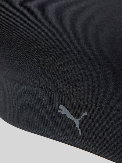 Produktfoto, schwarzer Triangel-BH mit Logo von PUMA aus elastischem Material-Mix, feine Rippenstruktur und glatte Oberfläche
