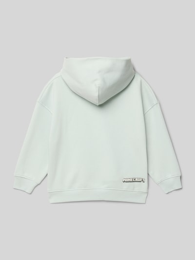 Produktfoto, Hoodie mit Kapuze von Mango aus Baumwoll-Mix in hellgrün mit Motiv-Print und gerippten Abschlüssen, lockerer Schnitt