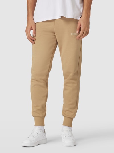 PUMA PERFORMANCE Sweatpants mit Label-Print Beige 4