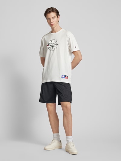 CHAMPION Szorty z dzianiny dresowej z detalami z logo model ‘Breakaway’ Czarny 1