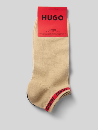 Produktfoto, beige Socken aus Baumwoll-Mix von HUGO für Herren, rote Details am Bündchen, weiche Textur, simple Form
