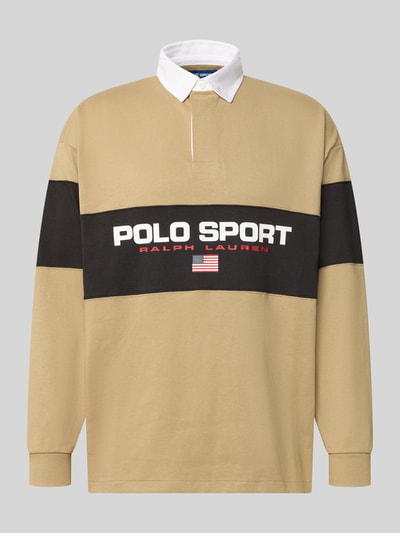 Produktfoto, Relaxed Fit Poloshirt aus reiner Baumwolle von Polo Ralph Lauren in Beige mit schwarzem Blockstreifen, weißem Kragen und Logo.