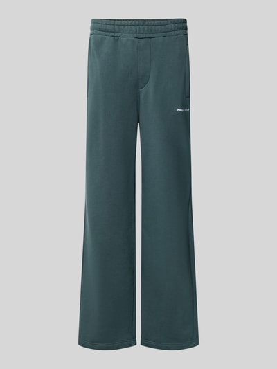 Produktfoto, Loose Fit Sweatpants aus Baumwoll-Mix mit Label-Detail von PEGADOR in Dunkelgrün, elastischer Bund, Eingrifftaschen, gerade Form, Innenbeinlänge 70 cm.