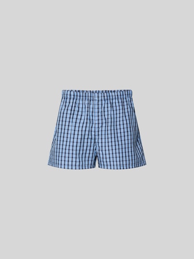 Produktfoto, Boxershorts aus reiner Baumwolle von VETEMENTS in blau kariert, lockere Passform, elastischer Bund, Label-Patch, Trennungsnähte, Innenbeinlänge 6 cm, Bundweite 36 cm, glatte Textur.