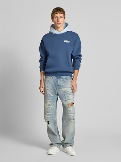 REVIEW Baggy fit jeans in een destroyed-look Lichtblauw - 1