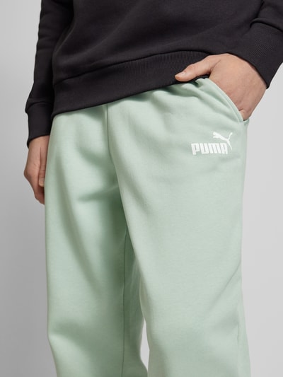 PUMA PERFORMANCE Spodnie dresowe o kroju relaxed fit z nadrukiem z logo Limonkowy 3