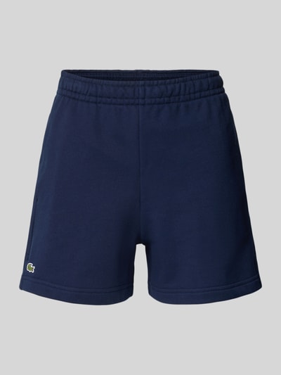 Produktfoto, Regular Fit Sweatshorts aus reiner Baumwolle von Lacoste Sport, granatowe, jednokolorowe, z logo, elastyczny pas, boczne kieszenie