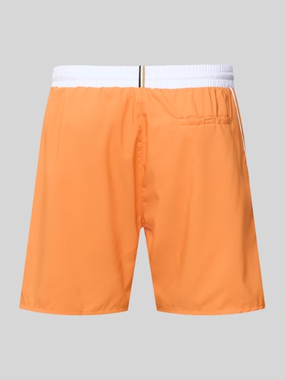 Produktfoto, Badehose mit Paspelnaht in Kontrastfarbe Modell STARFISH von BOSS in Orange mit weißem Bund, Gesäßtasche, Popeline-Material.