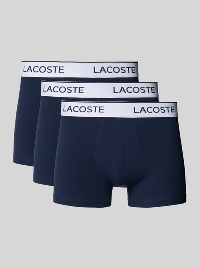 Produktfoto, Slim Fit Trunks aus Baumwoll-Mix in 3er-Pack von Lacoste in Optik: Unifarben, Passform: Slim-Fit, elastischer Label-Bund, Multipack:3er-Pack, Materialverarbeitung: Stretch, Material: Baumwoll-Mix, dunkelblaue Farbe, glatte Textur.